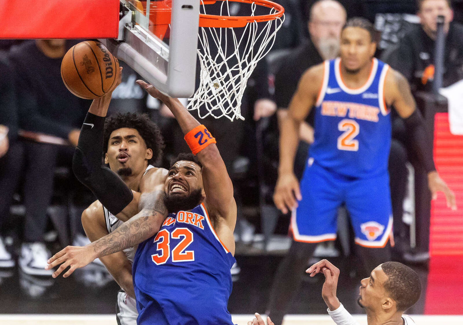 New York Knicks center Karl-Anthony Towns (32) attempts to shoot the ball during the fourth quarter.
