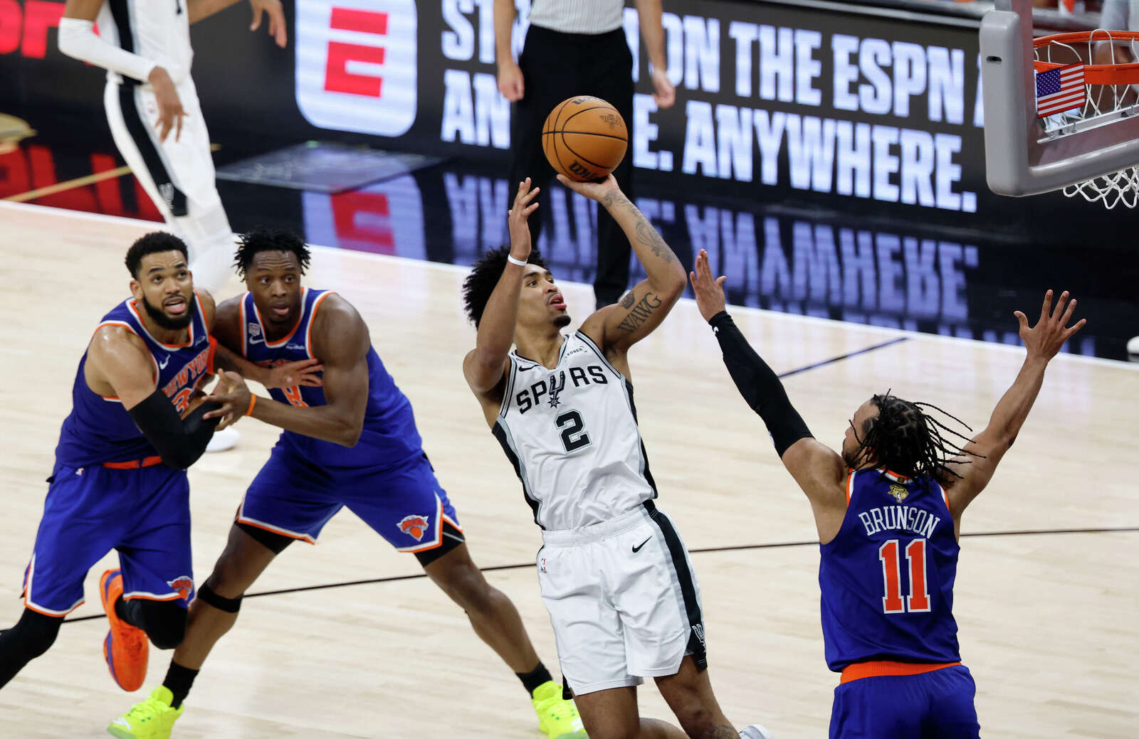 San Antonio Spurs guard Dylan Harper (2) takes the jump shot over New York Knicks guard Jalen Brunson (11) during the fourth quarter.