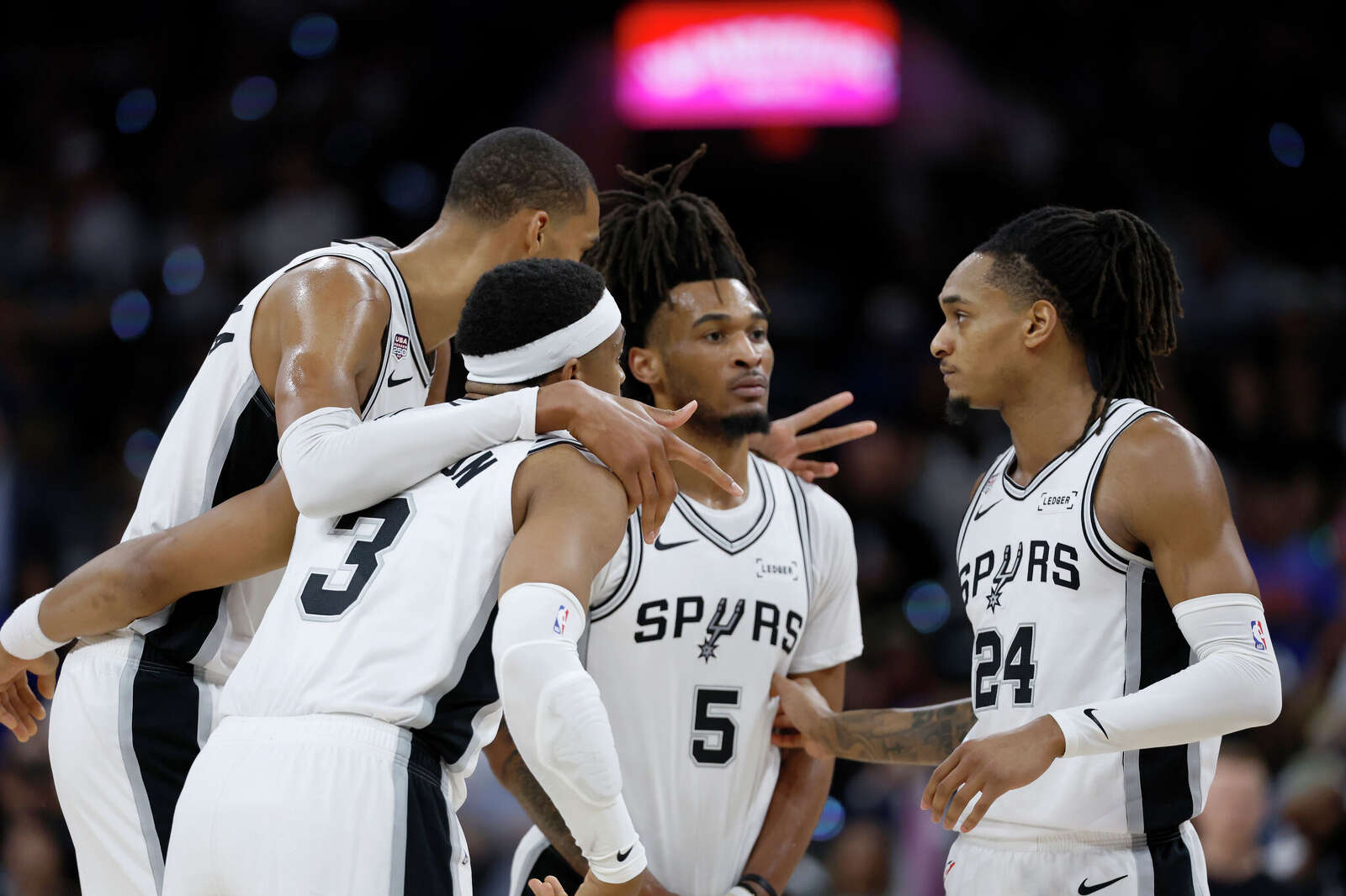 San Antonio Spurs center Victor Wembanyama (1) tries to rally the troops during the third quarter.