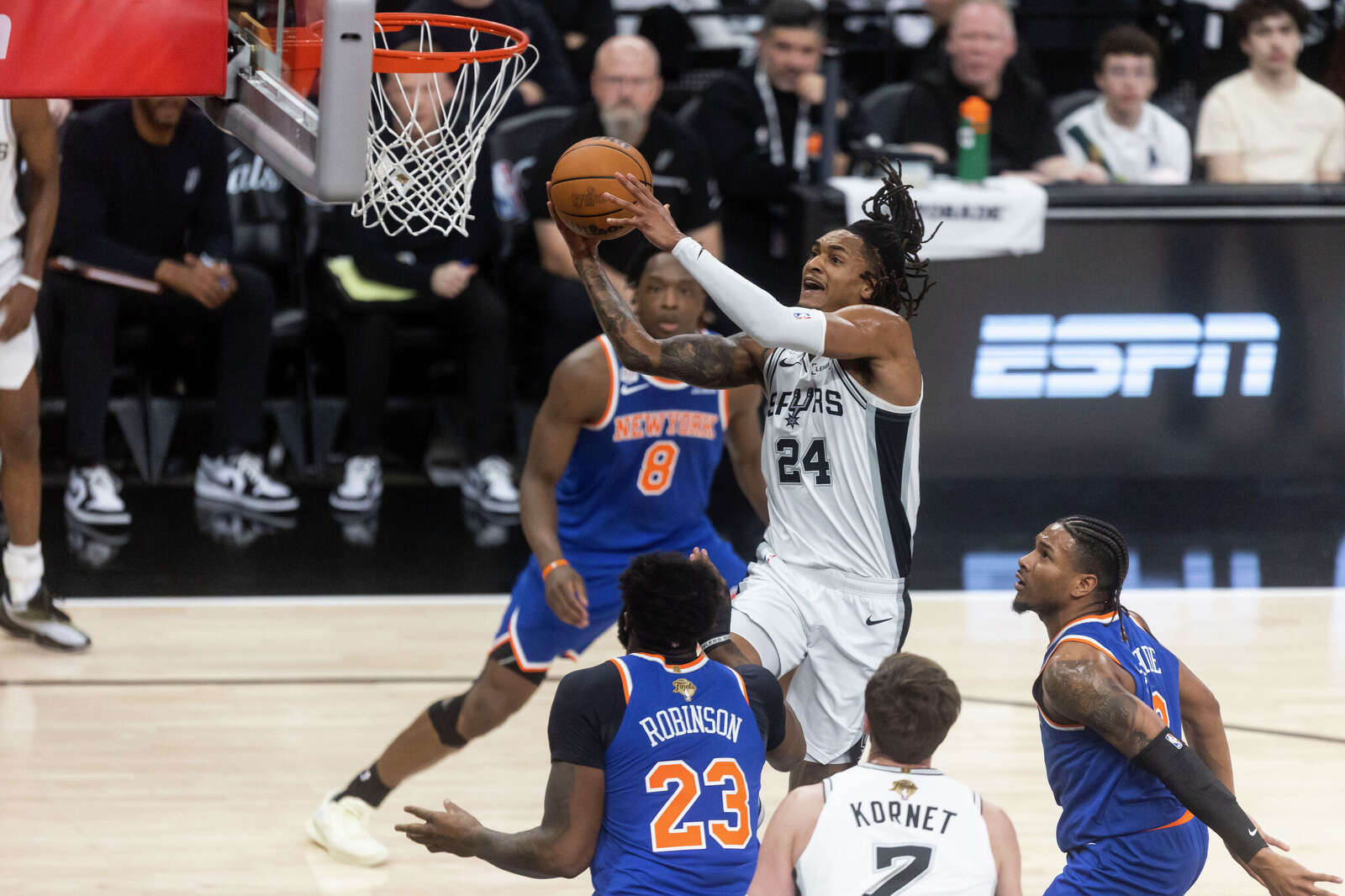 San Antonio Spurs guard Devin Vassell (24) shoots the ball during the first quarter of game 2.