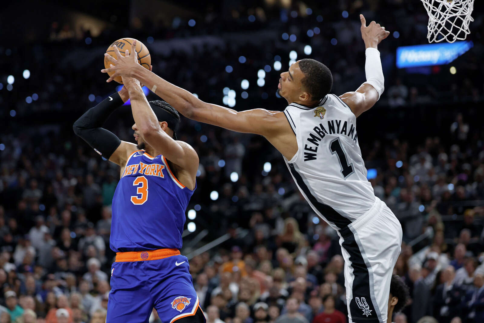 San Antonio Spurs center Victor Wembanyama (1) blocks a pass by New York Knicks guard Josh Hart (3) during the first quarter of game 2.