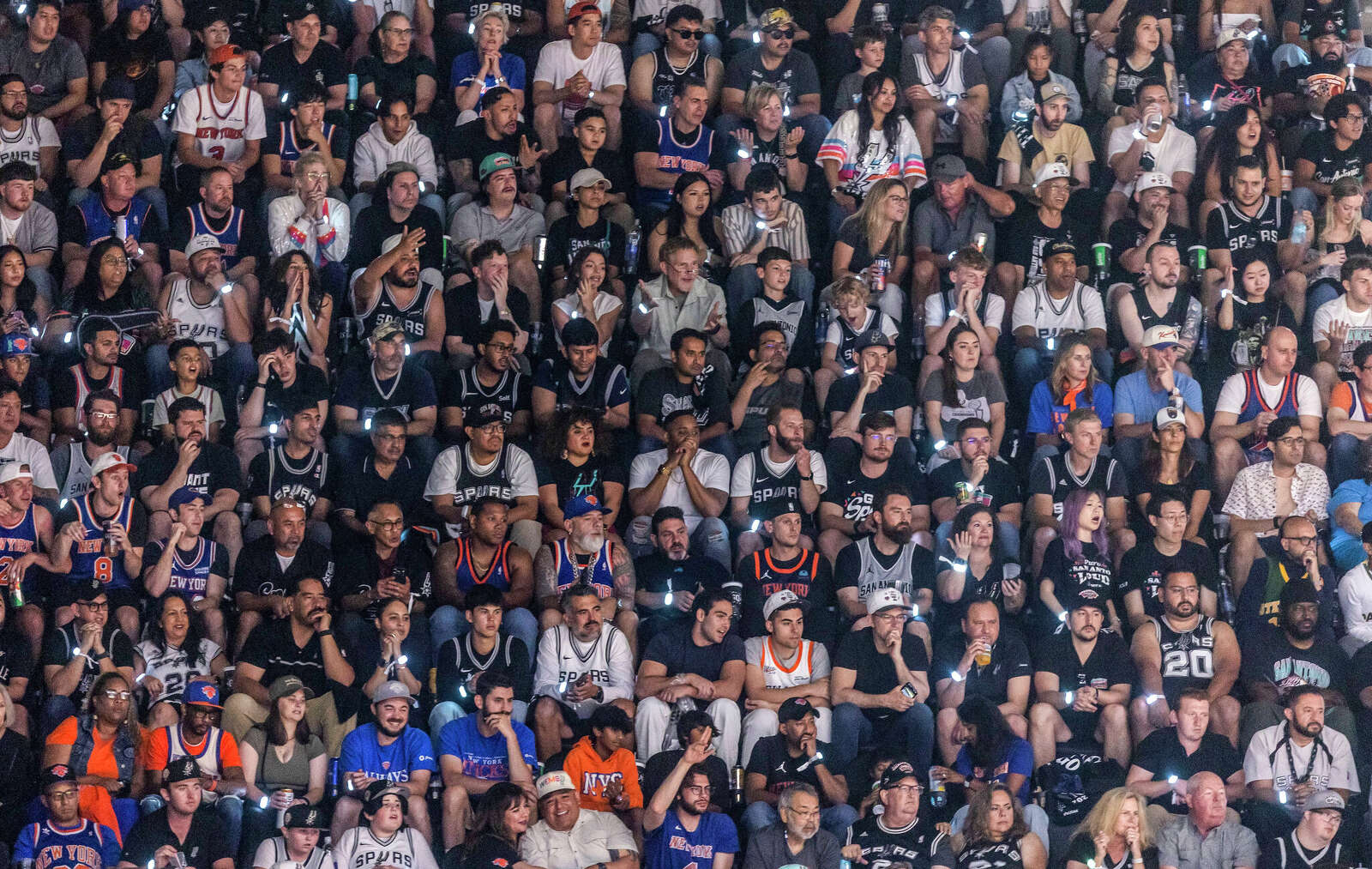 Fans cheer during game 2 of the NBA Finals at Frost Bank Center.