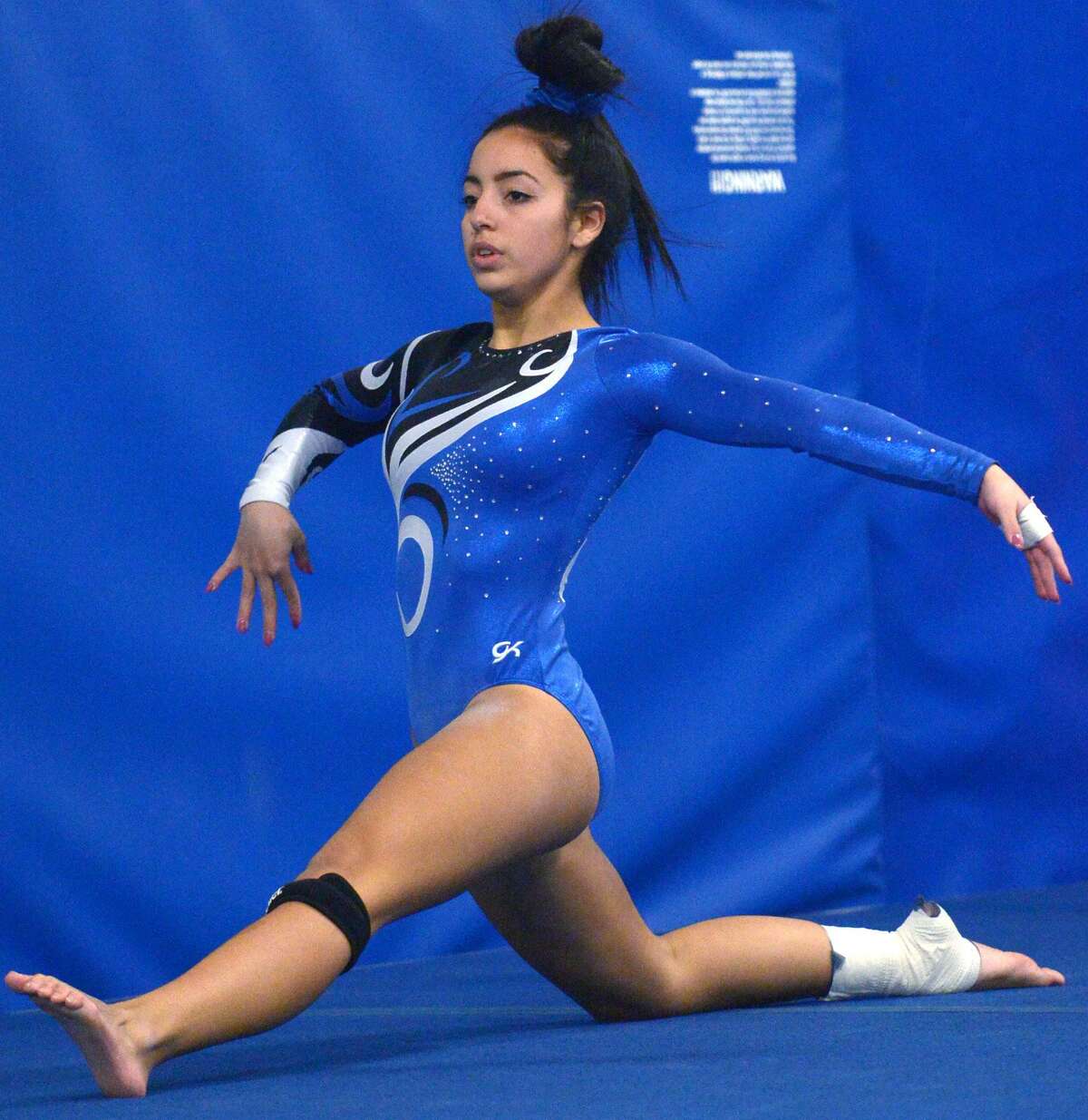 Staples takes on Wilton in FCIAC Girls Gymnastics