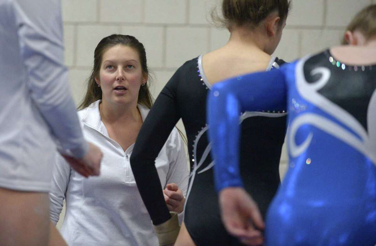 Staples takes on Wilton in FCIAC Girls Gymnastics