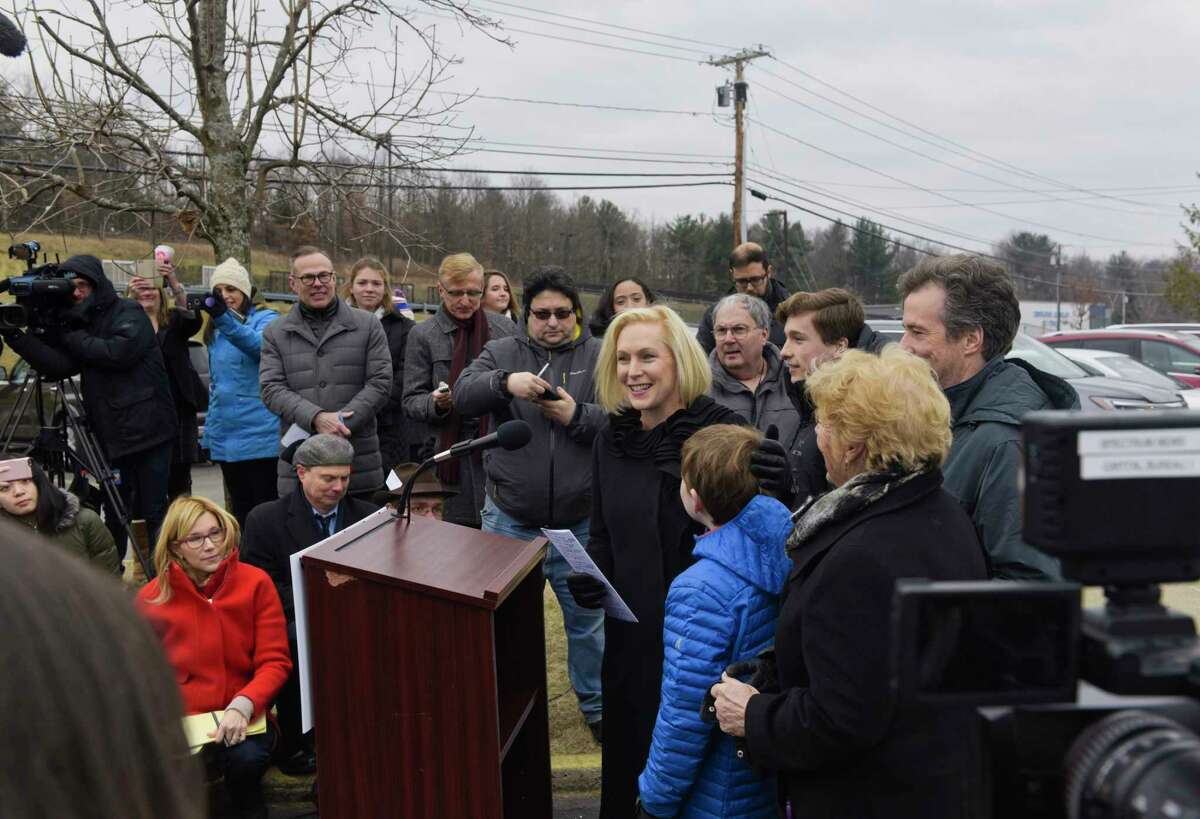 Presidential candidate, U.S. Sen. Kirsten Gillibrand, with her husband, sons, and mother by her side, talks to a large gathering of media outside the Country View Diner on Wednesday, Jan. 16, 2019, in Brunswick, N.Y. Gillibrand came to the diner with family and friends the day after making an announcement on The Late Show with Stephen Colbert that she would be running for President in 2020. (Paul Buckowski/Times Union)