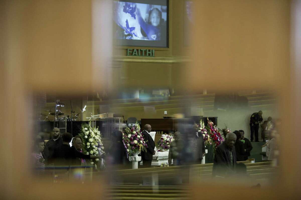 Mourners pay their respects before the funeral service for Jazmine Barnes at Community of Faith Church in Houston, Jan. 8, 2019. Barnes, 7, was shot and killed in Houston while in a car with her family. As of Tuesday, two men have been charged in her death. (Scott Dalton/The New York Times)