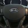 FILE — This Oct. 5, 2012, file photo, shows a Kia optima's steering wheel.