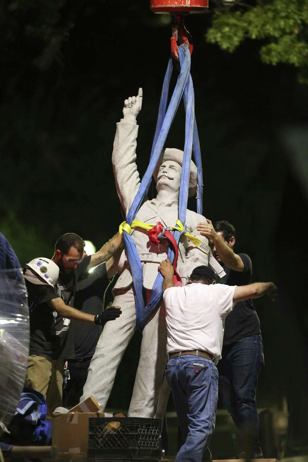 The Confederate statue is removed from Travis Park on August 31, 2017.