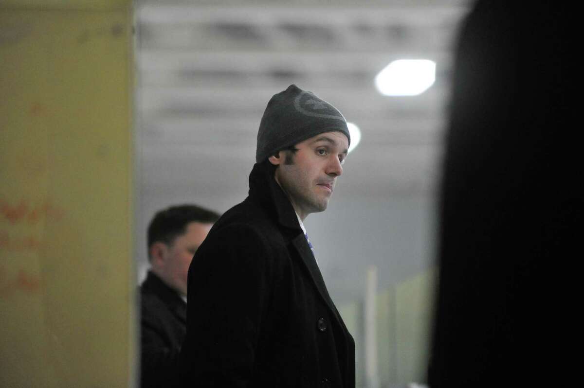 Head Coach John Longo of the Notre Dame Fairfield Lancers watches the action during a game against the Simsbury Trojans on Wednesday January 16, 2019 at The Rinks in Shelton, Connecticut.