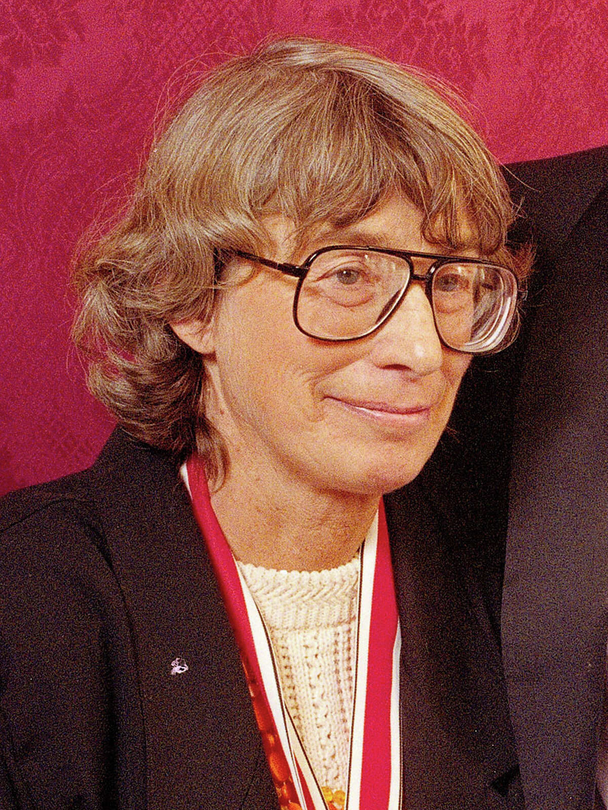 FILE - In this Nov. 18, 1992 file photo, Mary Oliver appears at the National Book Awards in New York where she received the poetry award for her book "New and Selected Poems." Oliver, a Pulitzer Prize-winning poet whose rapturous odes to nature and animal life brought her critical acclaim and popular affection, died Thursday at her home in Hobe Sound, Fla. The case of death was lymphoma. She was 83.