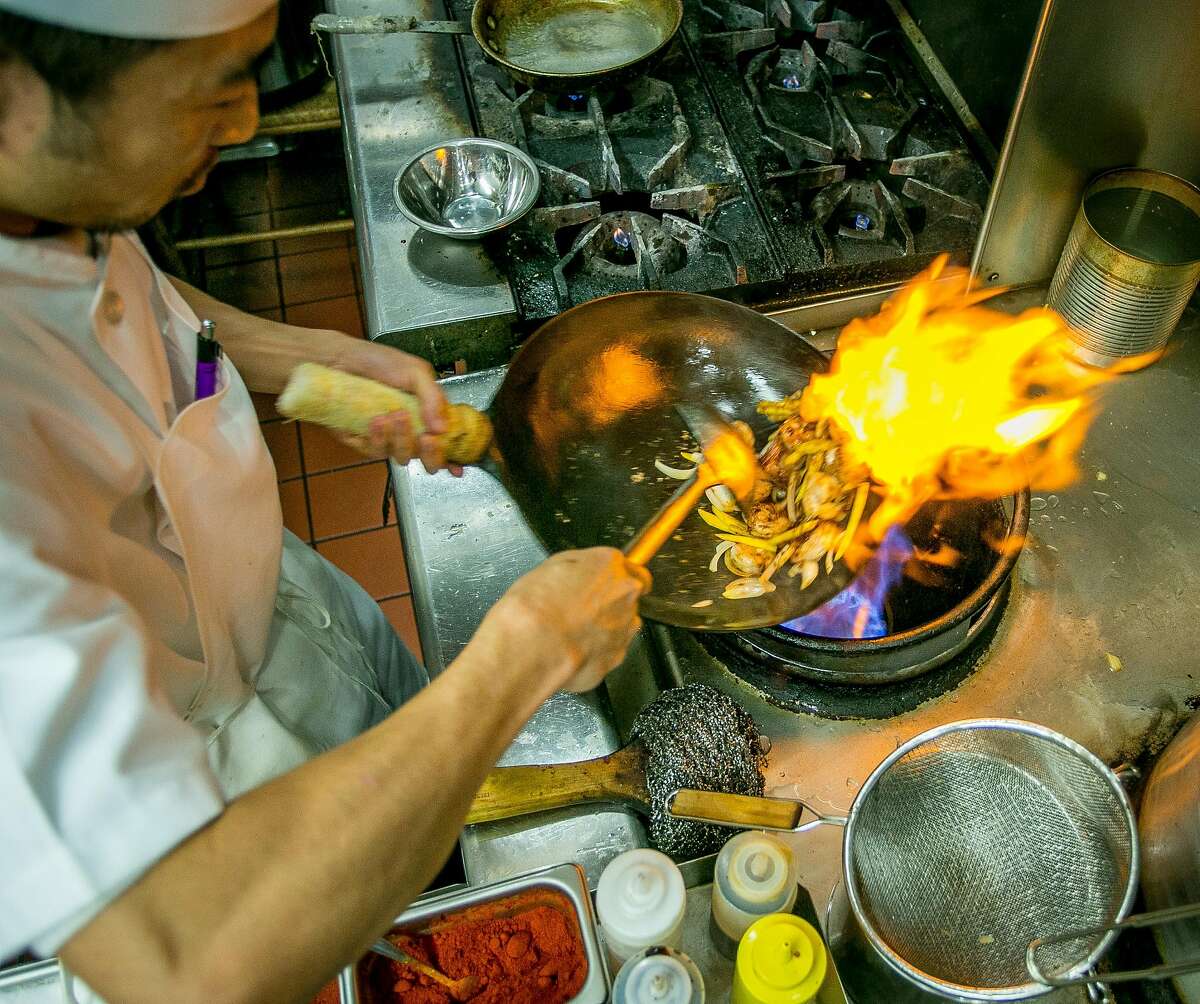 Chef Than Win makes Mango Shrimp at Rangoon Ruby in San Carlos, Calif., on November 7th, 2013.