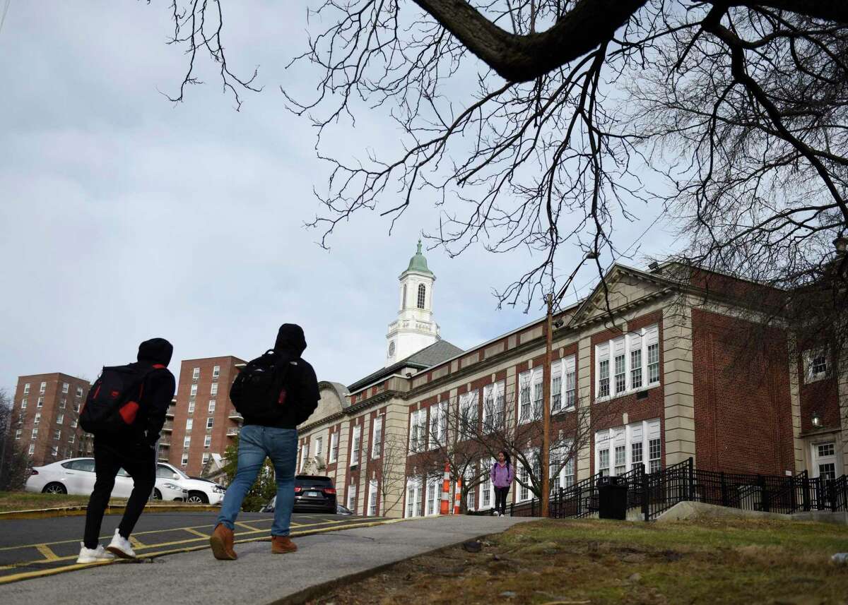 Students leave school after the closing bell at Stamford High School in Stamford, Conn. Thursday, Jan. 10, 2019.