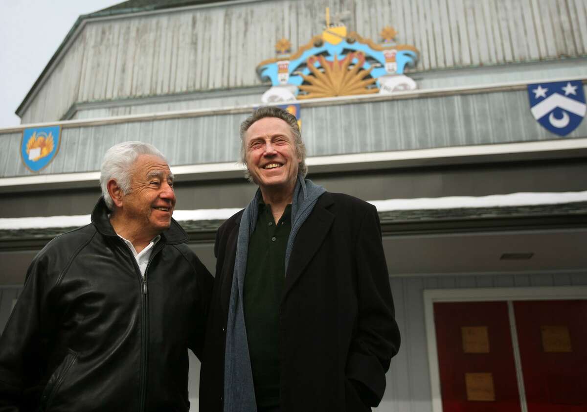 Master carpenter Joe Patria, left of Stratford, set builder at the American Shakespeare Theatre, greets actor Christopher Walken during a tour theater in Stratford on Sunday, February 17, 2013. Walken later gave a talk to benefit the Stratford Arts Commission and the Stratford Center for the Arts.