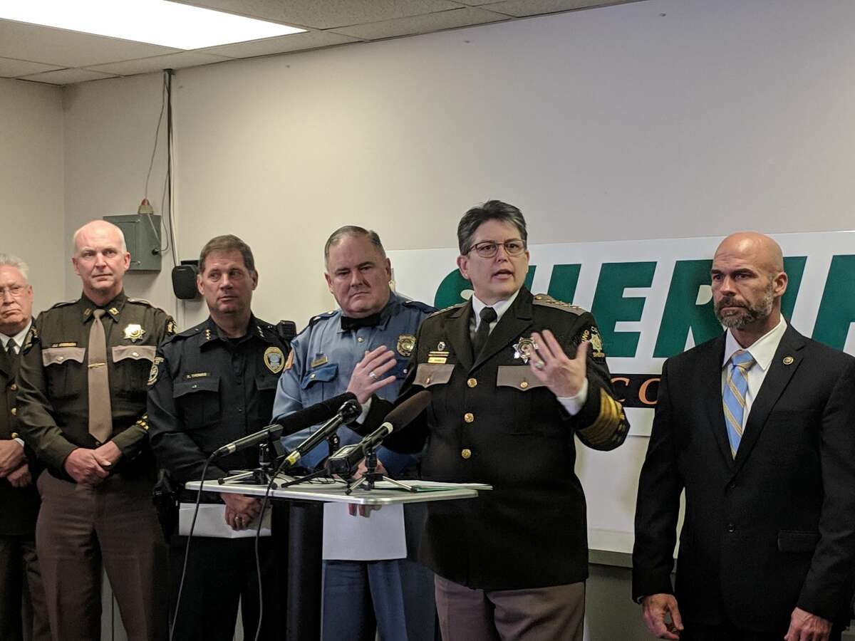 King County Sheriff Mitzi Johanknecht, along with State Patrol Capt. Ron Mead, to the left, asked the public's help in solving a spate of shootings along state Route 509 since June 2018. They are investigating at least 11 shootings in the area, but do not know whether they're related. One shooting blinded a 14-year-old boy riding in a car Dec. 20, 2018.