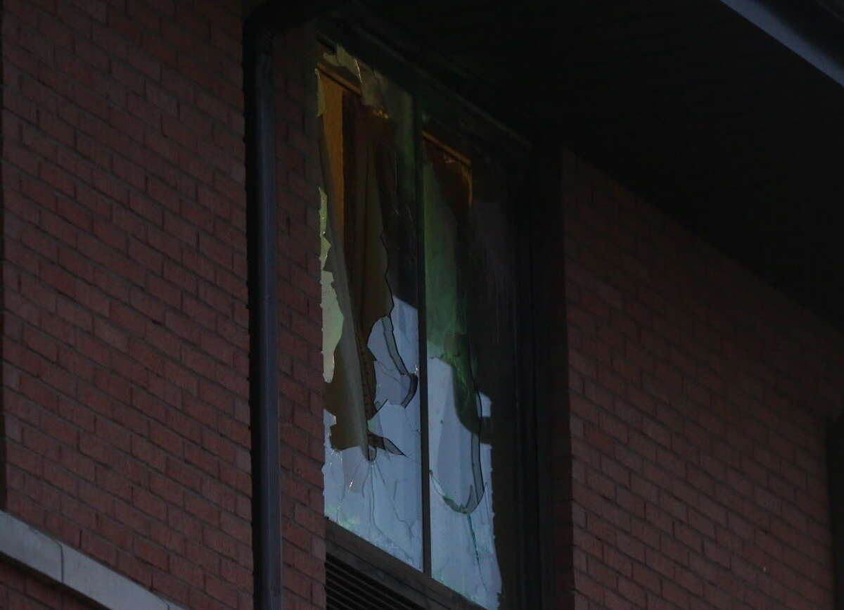 HCSO SWAT team broke the hotel window of Christ the Redeemer Catholic Church shooting suspect Arthur Edigin, 62, at the Extended Stay America on West Sam Houston Parkway South earlier on Friday, Jan. 18, 2019, in Houston. HCSO officers located the suspect at the third floor of the hotel early morning and he was found dead in the hotel bathroom with a self-inflicted wound shortly before 7 a.m.