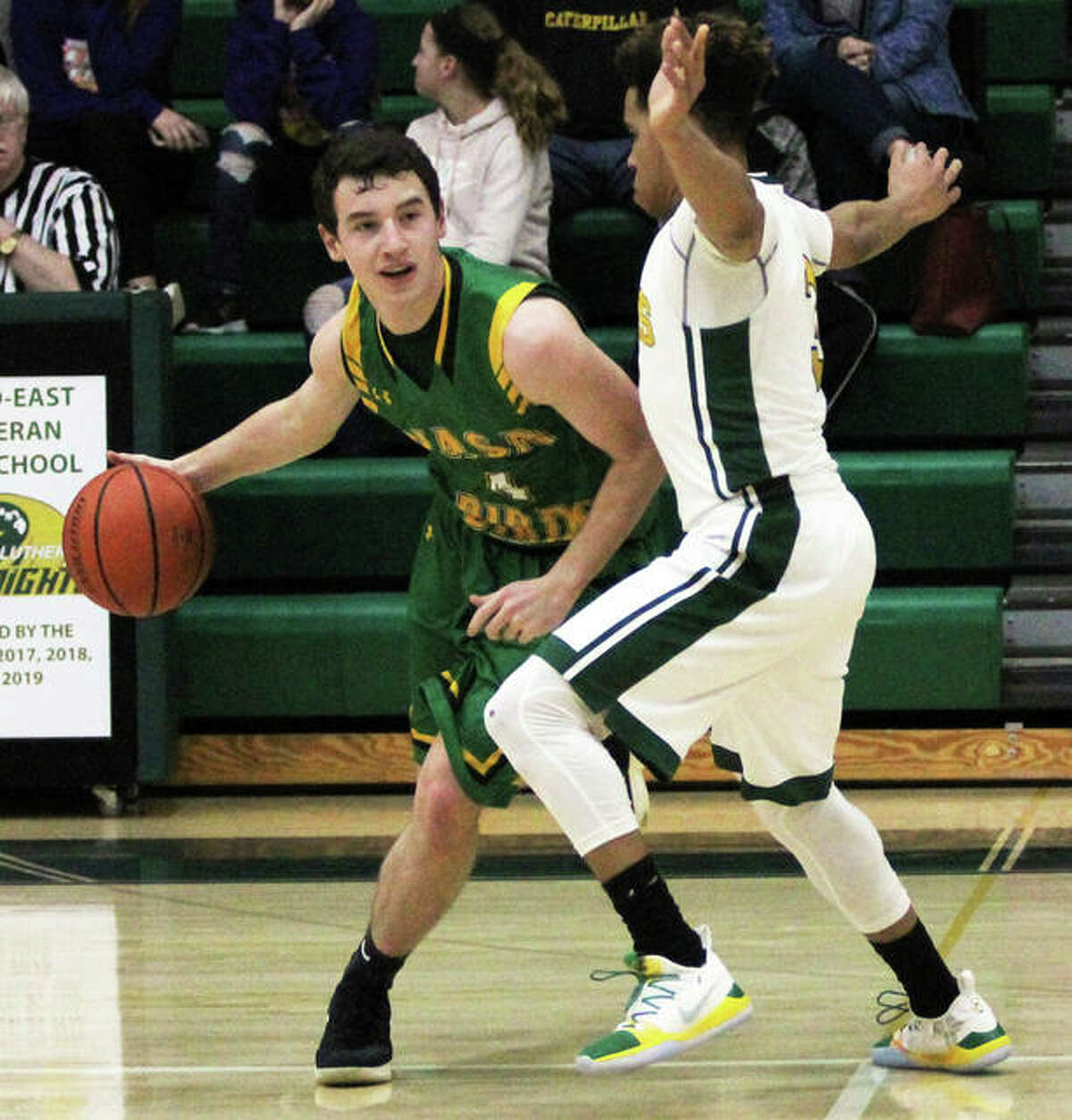 Southwestern’s Johnathan Watson (left), shown in a game earlier this season at Metro-East Lutheran in Edwardsville, had eight points and 12 rebounds Thursday night in the Piasa Birds win over Staunton at the Macoupin County Tourney in Mount Olive.