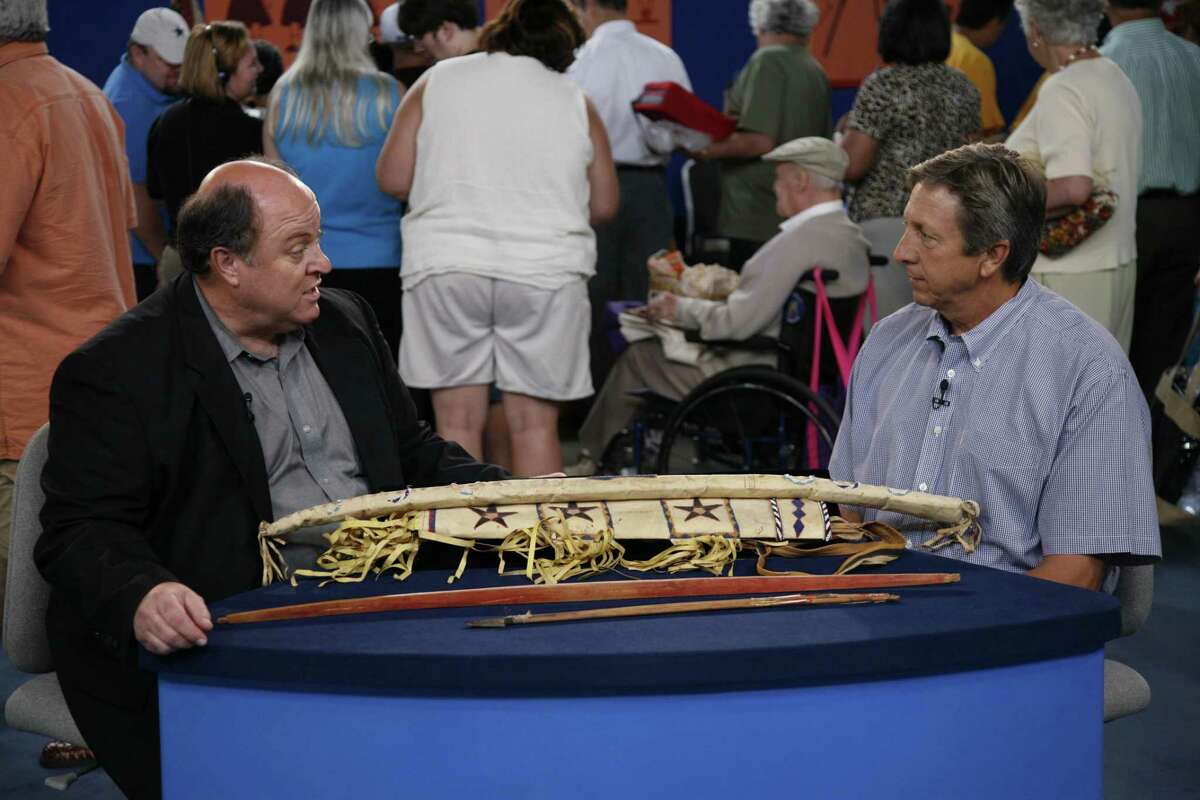 Bruce M. Shackelford (left) appraises a Geronimo-signed bow case and quiver at the 2007 'Antiques Roadshow' San Antonio event. Shackelford is an expert in tribal art and is based in San Antonio. It’s uncertain if he will appraise at the April 27, 2019, “Roadshow” event at the McNay Art Museum.
