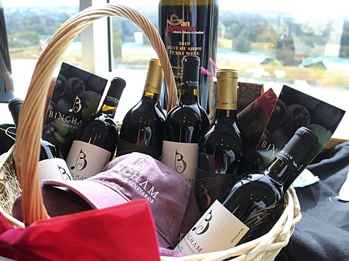 An auction basket of wines from Bingham Family Vineyards, a Texas winemaker whose 2016 Dugout Dry Red Wine was named Best in Show Texas Wine at the 2019 San Antonio Stock Show & Rodeo wine competition.