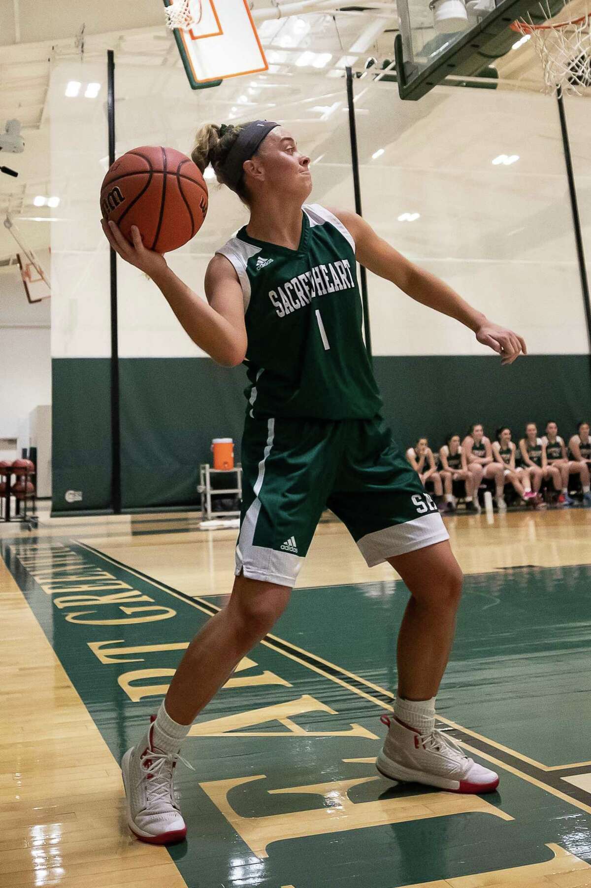 Ryan Smith (1) of Sacred Heart launches the ball the length of the court during a game between Choate Rosemary Hall and Sacred Heart Academy on January 18, 2019 at Sacred Heart Academy - Greenwich in Greenwich, CT.