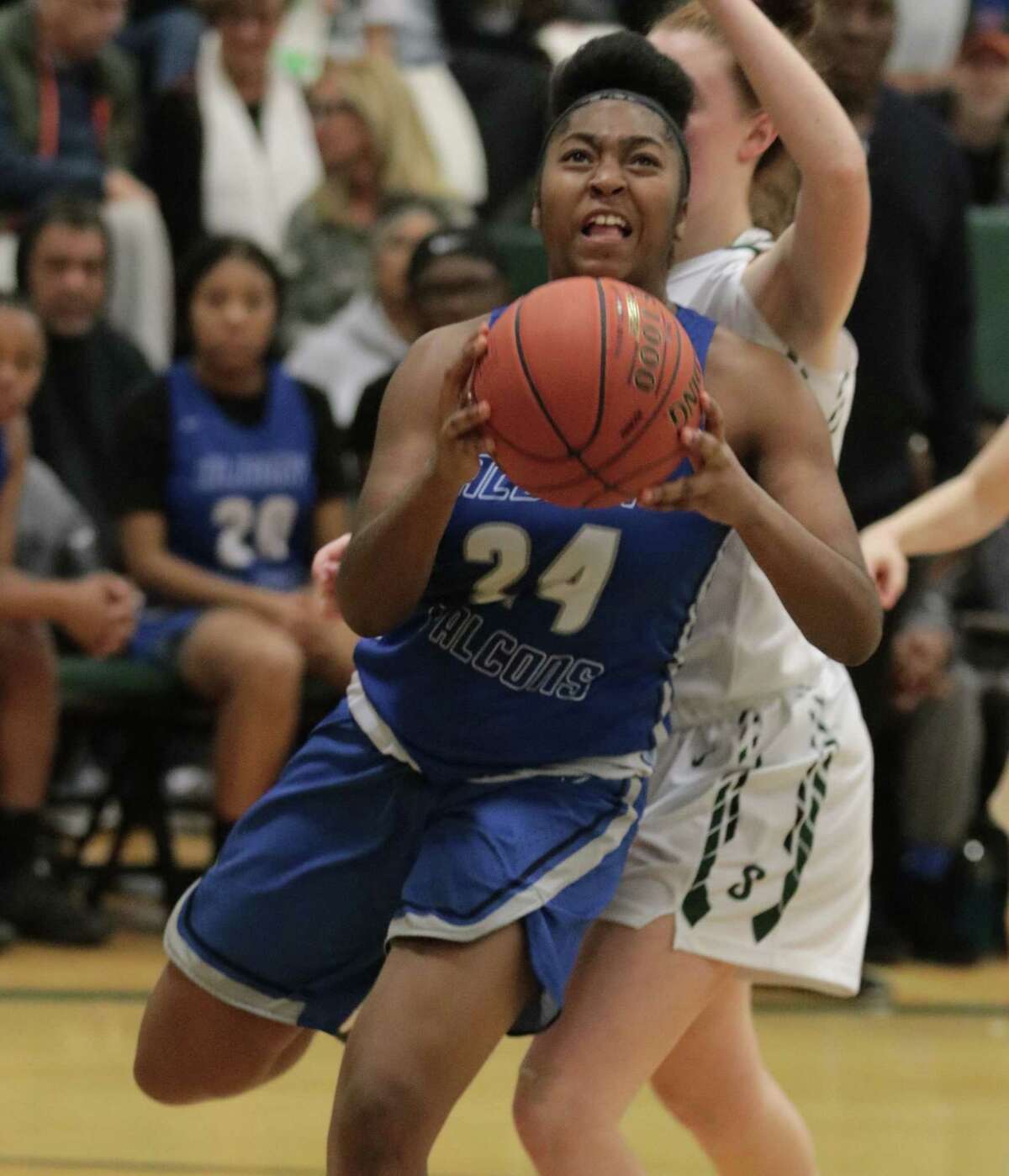 Albany's Ahniysha Jackson takes aim after driving past Shen's Jillian Huerter during the girls' basketball matchup at Shenendehowa High School Friday, January 18, 2019. (Ed Burke photo-Special to the Times Union)