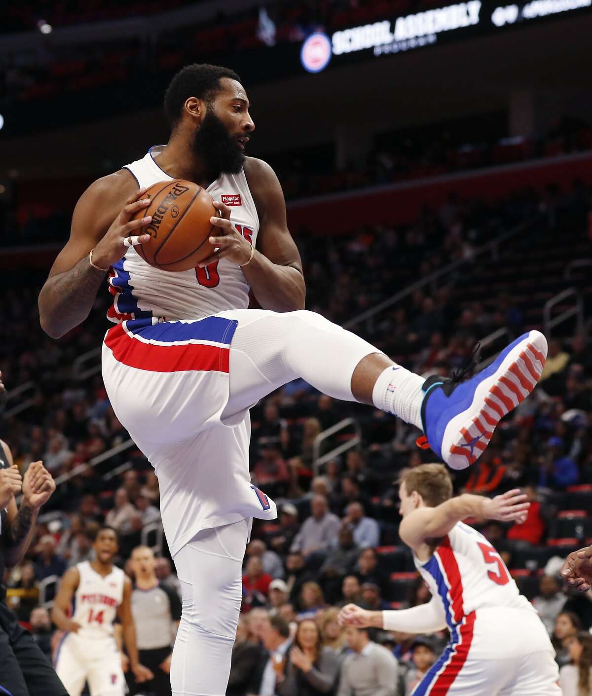 Detroit Pistons center Andre Drummond grabs a rebound during the second half of an NBA basketball game against the Orlando Magic, Wednesday, Jan. 16, 2019, in Detroit. (AP Photo/Carlos Osorio)