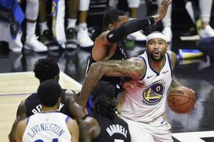 Despite fouling out, Cousins impresses in debut as Warriors beat Clippers - Photo