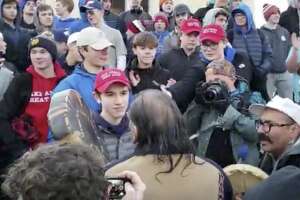 Students in 'MAGA' hats mock Native American after rally - Photo
