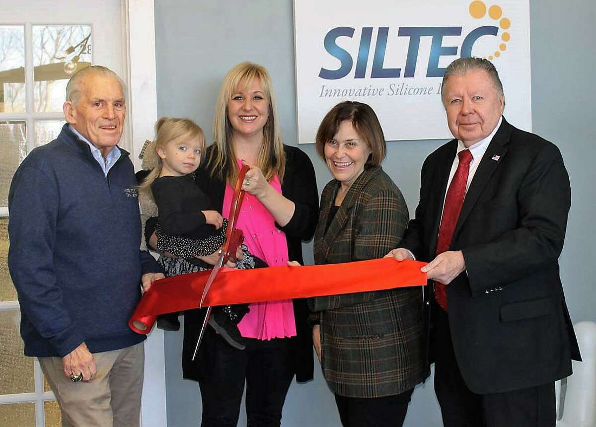 SilTec Labs, innovative silicone specialists, had a grand opening in Portland Friday. From left are Middlesex County Chamber of Commerce President Larry McHugh, Dallas Radziwon, Owner Leigh Radziwon, Portland First Selectwoman Susan Bransfield and Chamber Chairman Jay Polke.