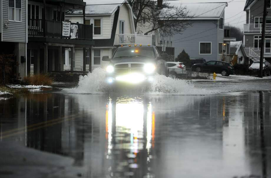 Flooding, trees and wires down across CT cause road closures