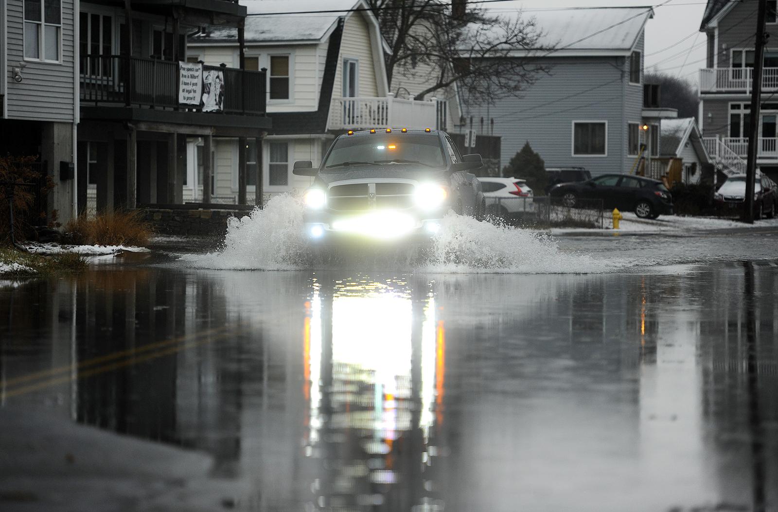 Flooding, trees and wires down across CT cause road closures ...