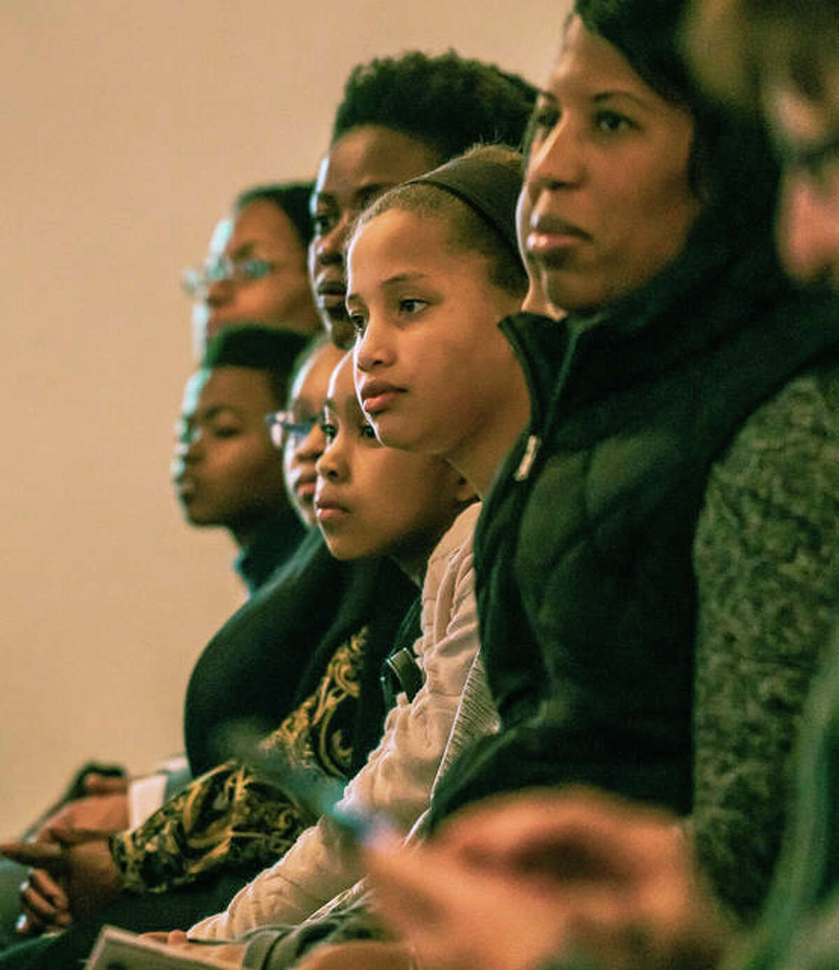 A family watches intently during a past Martin Luther King Jr. Day celebration at Mt. Joy Missionary Baptist Church.