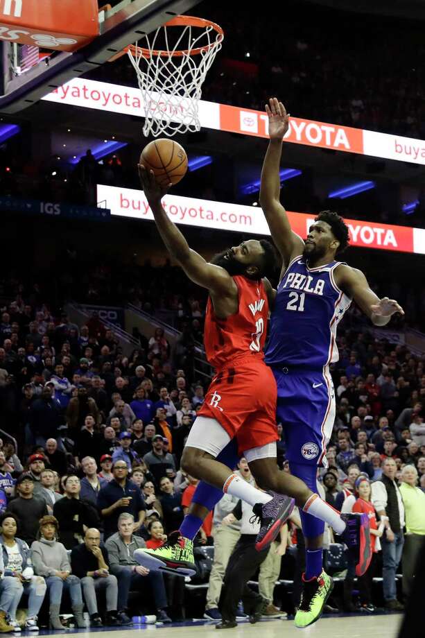 James Harden of the Houston Rockets, left, tries to get a shot from Joel Embiid of the Philadelphia 76ers in the first half of an NBA basketball game on Monday, January 21, 2019 in Philadelphia . (AP Photo / Matt Slocum) Photo: Matt Slocum, Associated Press / Copyright 2019 The Associated Press. All rights reserved