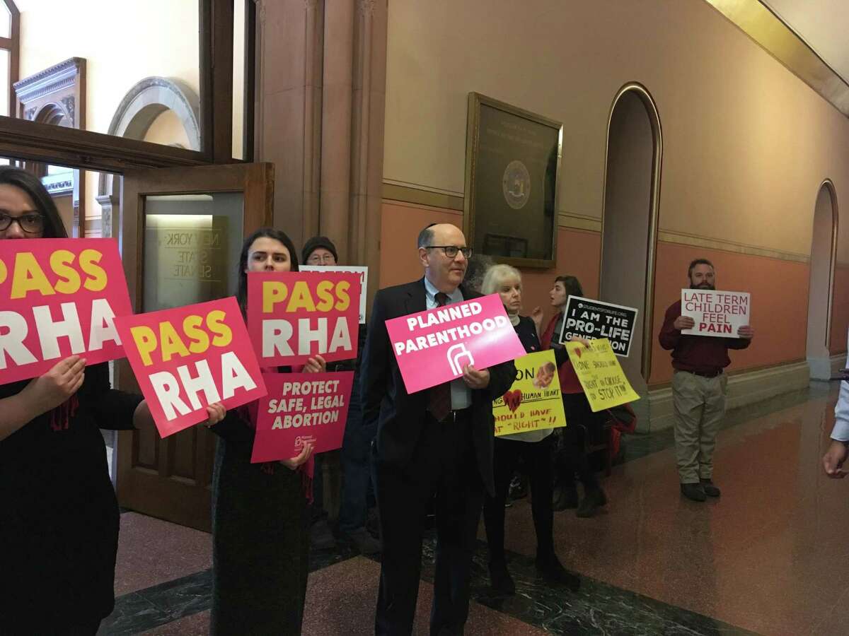 Supporters and opponents of the Reproductive Health Act line up outside a packed Senate Health Committee, which voted 10-5 in favor of enacting the bill on Tuesday, Jan. 22, 2019 in Albany, N.Y. (David Lombardo / Times Union)