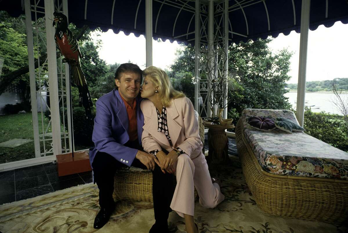 Donald Trump, real estate mogul, entrepreneur, and billionare, relaxes at his home with his wife, Ivana Trump, in August 1987 in Greenwich, Connecticut.