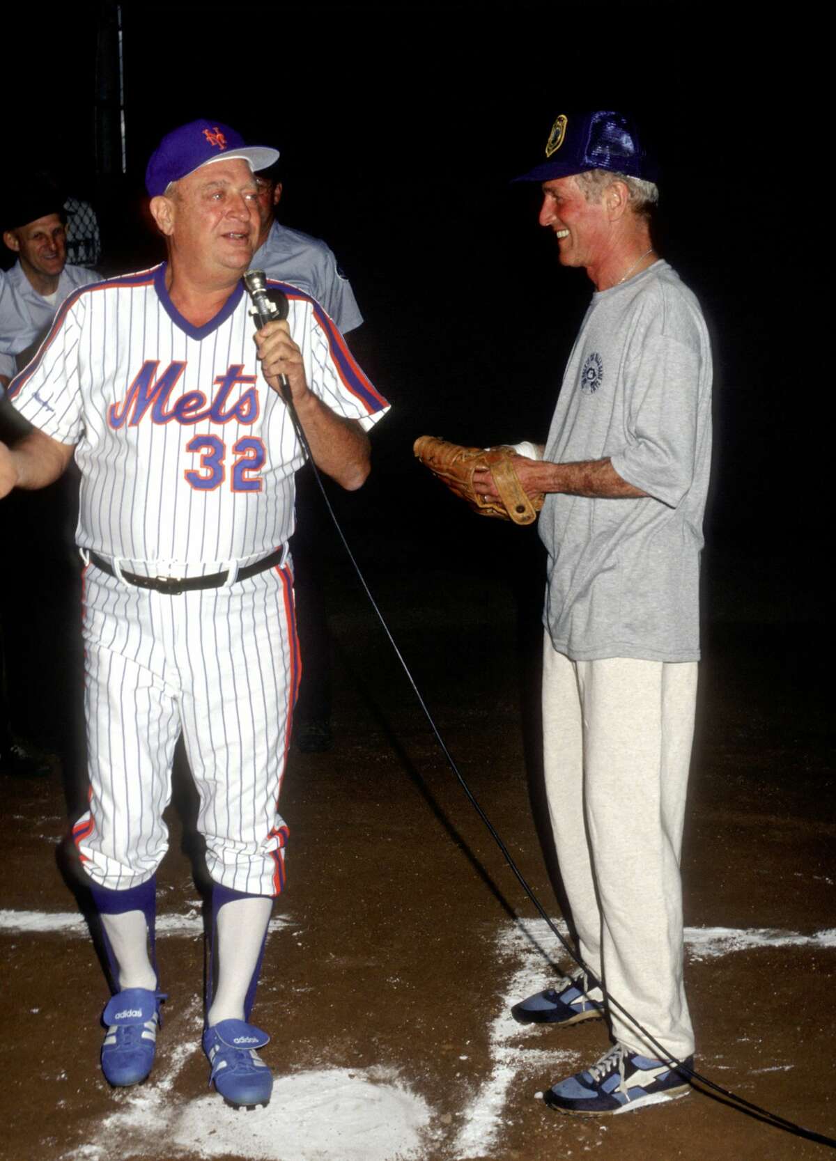Rodney Dangerfield and Paul Newman during Hole in The Wall Gang Camp Benefit Baseball Game in Westport, Connecticut, United States.