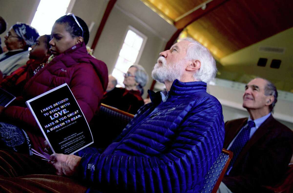 Worshippers were in good spirits at the 17th annual Interfaith Service for Martin Luther King, Jr., at United Methodist Church, Monday, Jan. 21, 2019, in New Canaan, Conn.