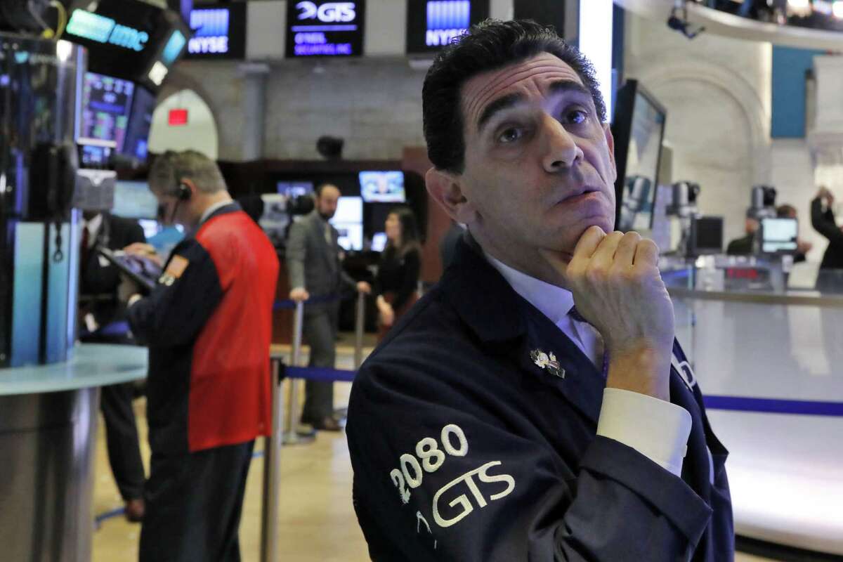 Specialist Peter Mazza works on the floor of the New York Stock Exchange, Wednesday, Jan. 2, 2019. Stocks are coming off their worst year in a decade as investors worry about slowing global economic growth and trade tensions between the U.S. and China. (AP Photo/Richard Drew)