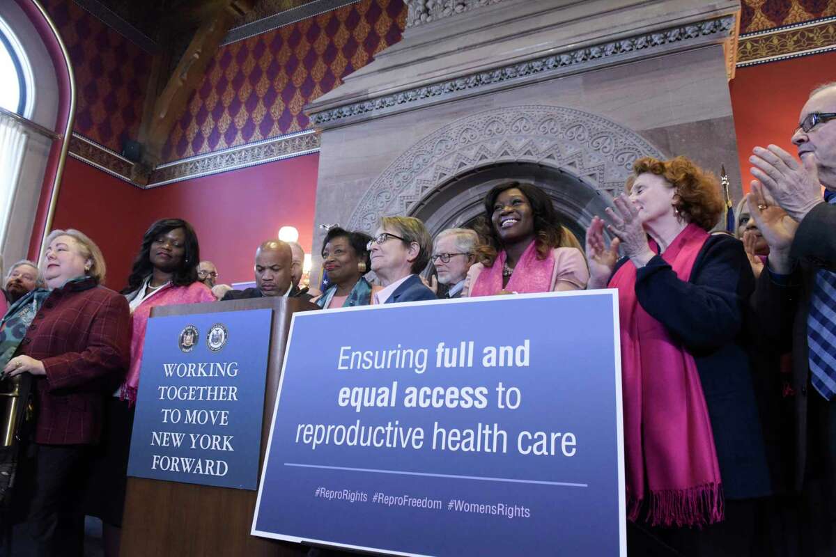 Cuomo Signs Reproductive Health Act After Legislature Votes 1115