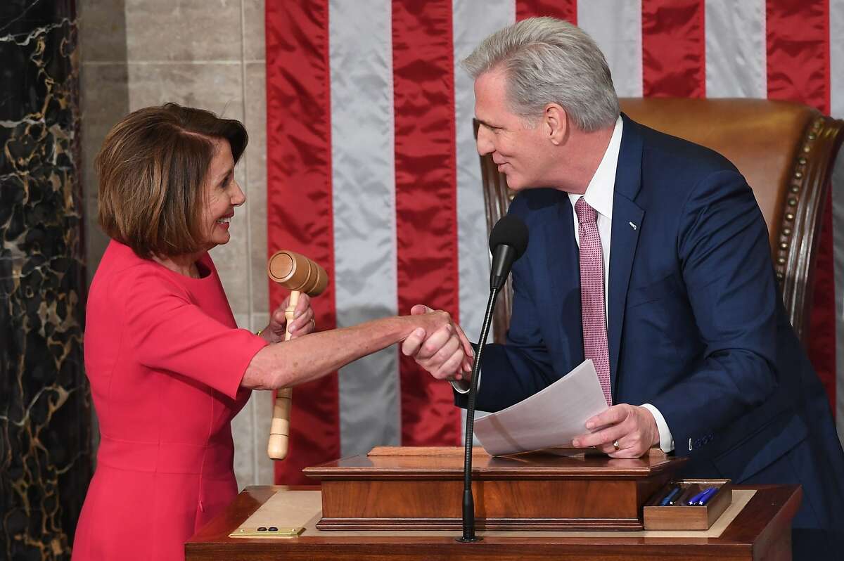 Incoming House Speaker Nancy Pelosi, D-CA, shakes hands with Minority Leader Kevin McCarthy during the opening session of the 116th Congress at the US Capitol in Washington, DC, January 3, 2019. Speaking privately to his donors, House Minority Leader Kevin McCarthy squarely blamed Republican losses in last year's midterm elections on the GOP push to roll back health insurance protections for people with preexisting conditions - and in turn blamed his party's right flank.