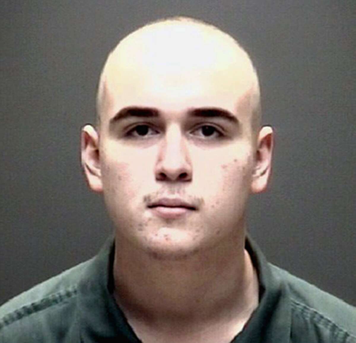 FILE - This file photo provided by the Galveston County Jail in Galveston, Texas, hows Dimitrios Pagourtzis. A change of venue is being sought for Pagourtzis, who is charged with capital murder in the fatal shooting of 10 people at a Texas high school on May 10, 2018. Attorneys for Pagourtzis filed a motion Tuesday, Jan. 8, 2019, in Galveston County District Court saying media coverage prejudice within the community prevents Pagourtzis from receiving a fair trial. (Galveston County Jail via AP, File)