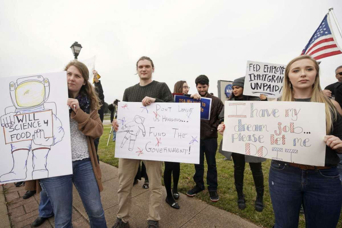 The ongoing government shutdown has affected many NASA employees, some of whom have attended protests outside Johnson Space Center. 