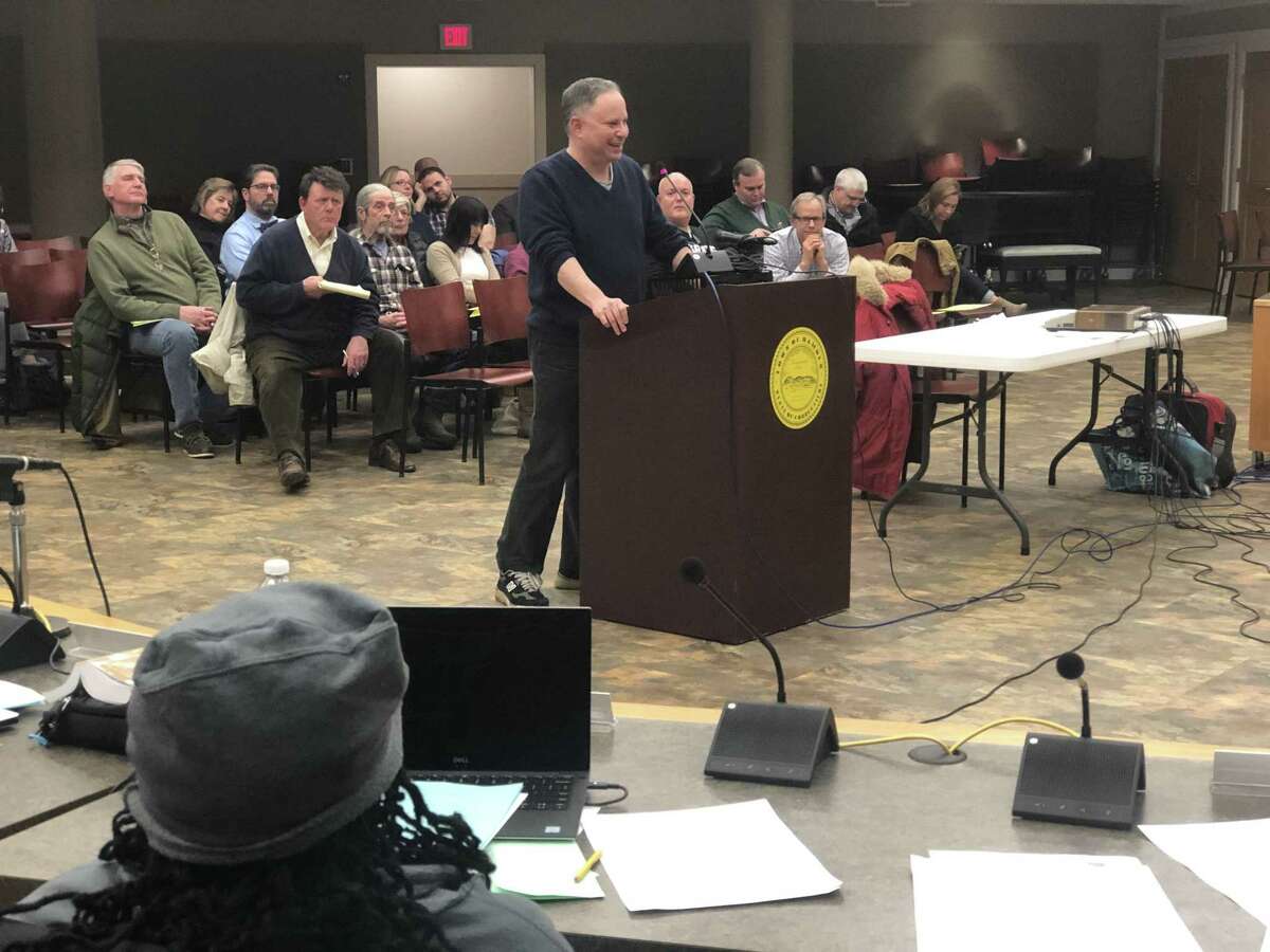 Hamden residents and interested observers weighed in on the idea of banning plastic bags from being distributed at checkout counters at the Jan. 22, 2019 meeting of the Legislative Council. Here, Seth Rosenthal speaks.