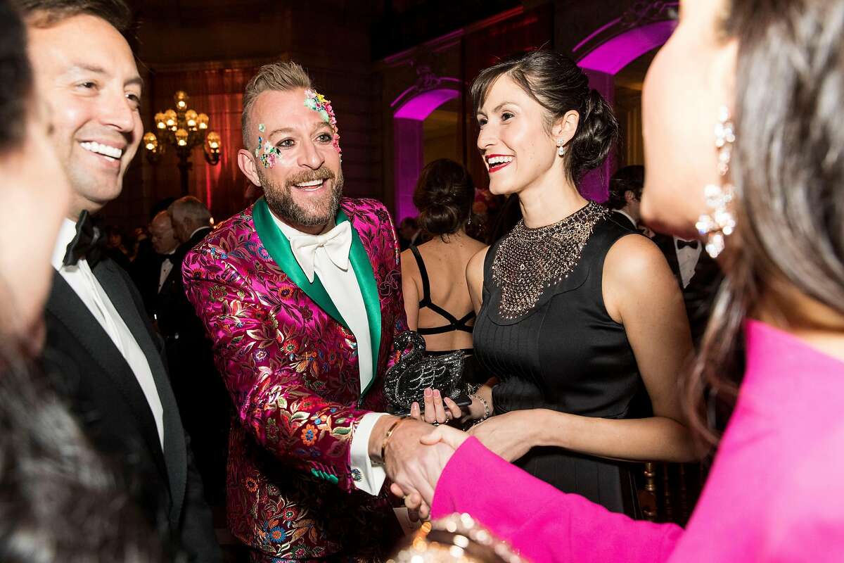 Michael Purdy (center) and Samantha Bechtel (second from right) chat with other guests of the San Francisco Ballet Opening Night Gala at City Hall in San Francisco, Calif., on January 23, 2019. The theme of the evening was "This is Passion."