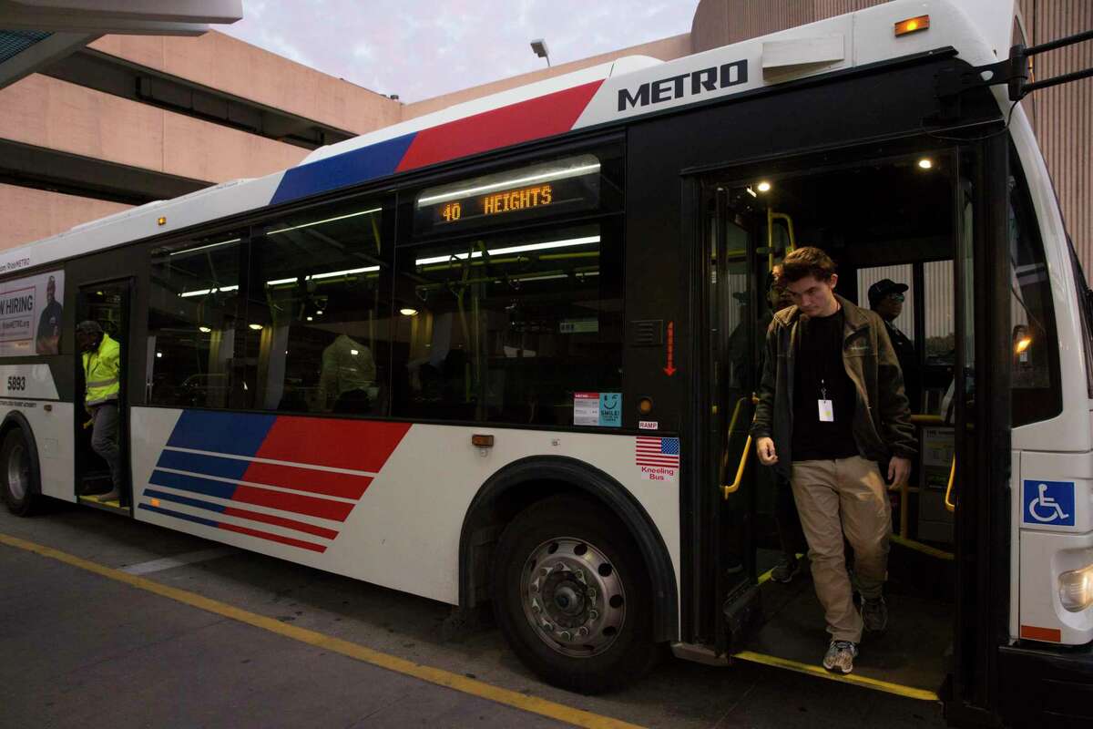 Passengers get off a METRO Transit Route 40 bus at William P. Hobby Airport transit center .