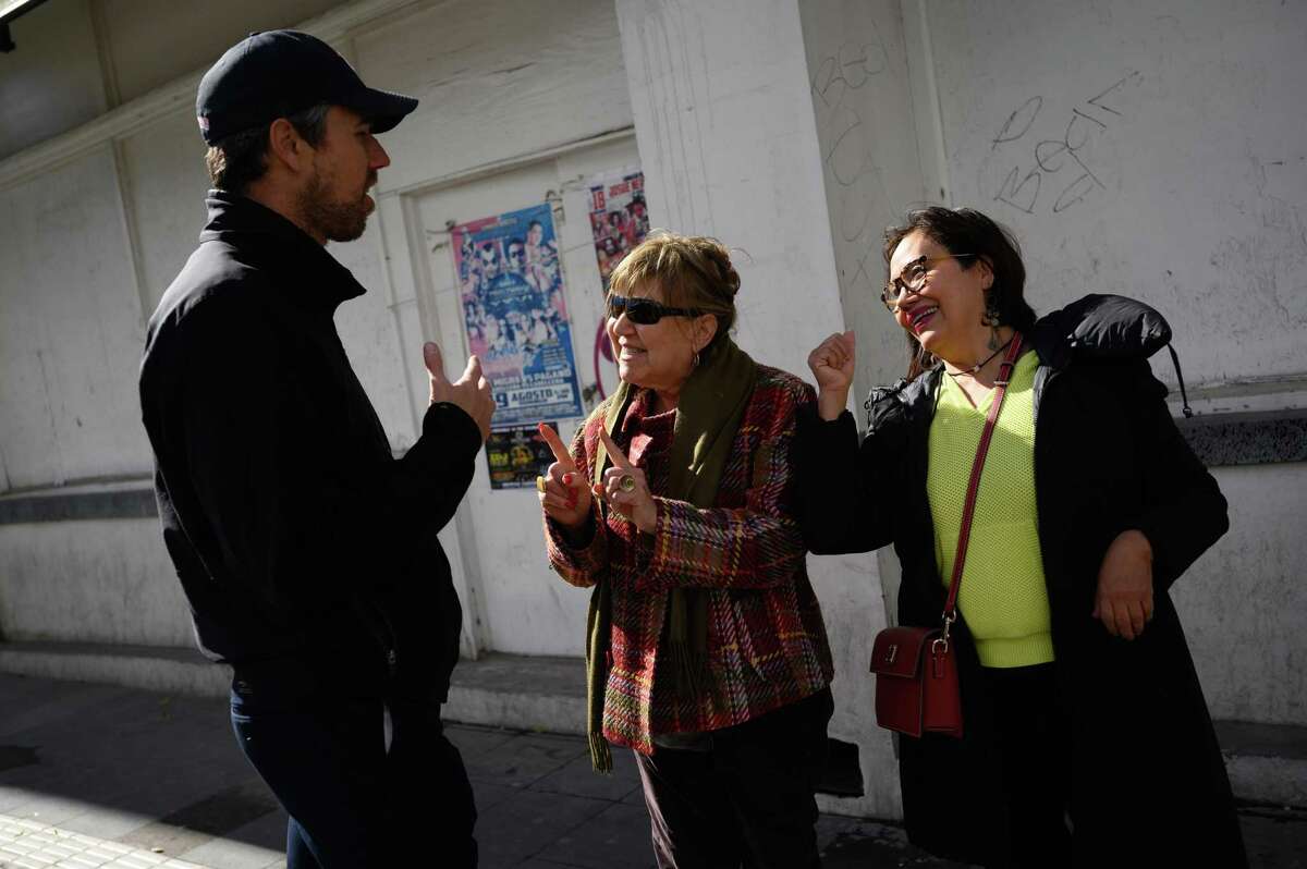 Blanca Sierra, 66, center, and Deyanira Rubio, 60, stop Beto O'Rourke on the street of Juarez to get a photo and urge him to run for president in 2020. The women worked the phone banks for him during his Senate race. They live in Texas and came to Mexico to shop. MUST CREDIT: Washington Post photo by Sarah L. Voisin
