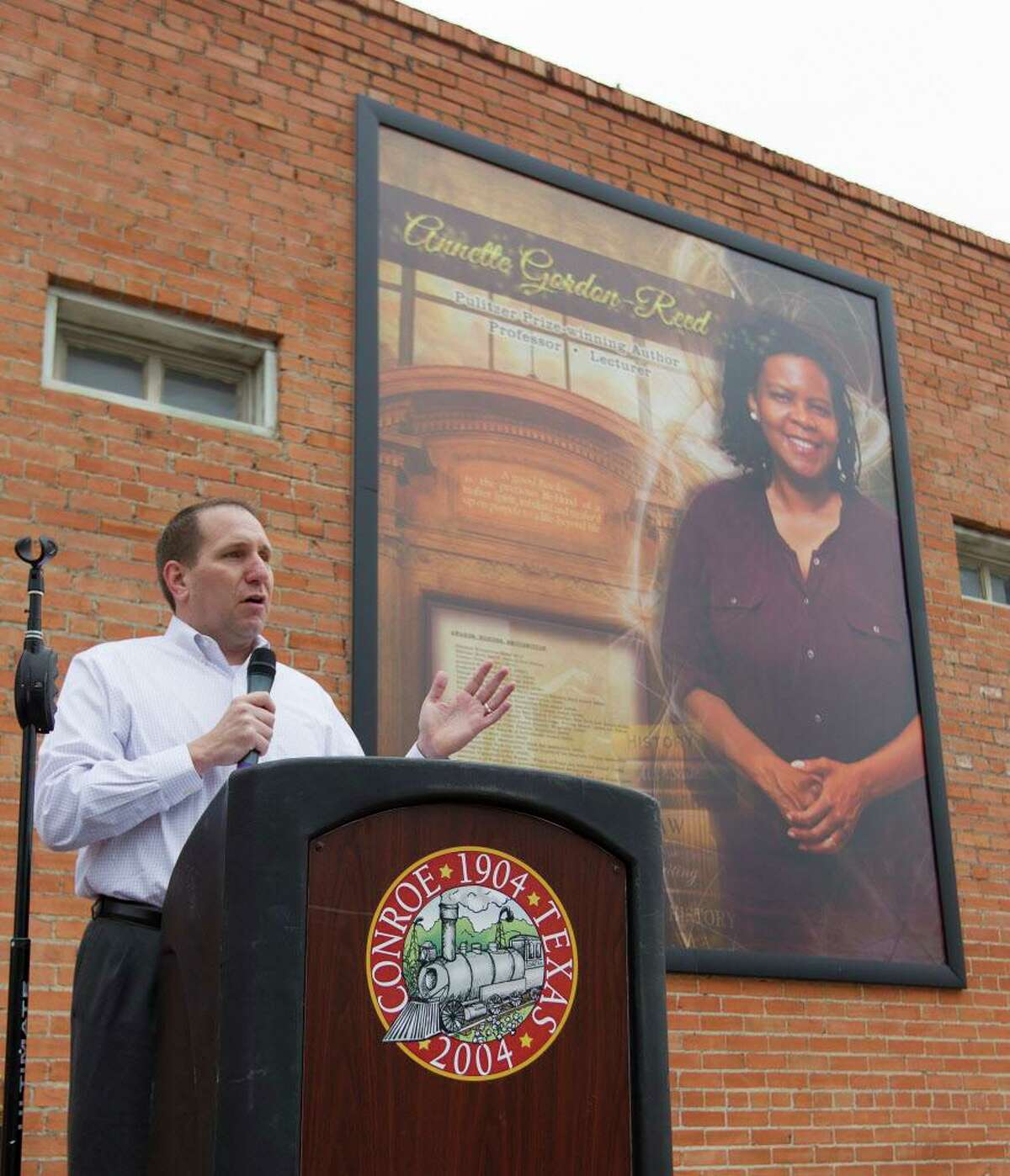 Dr. Curtis Null, then deputy superintendent of schools at Conroe ISD, speaks during the unveiling of a mural in honor of Annette Gordon-Reed at North Main Street and Metcalf Street, Saturday, April 22, 2017, in Conroe. The fourth addition to the Conroe Legends mural wall honored the 1977 graduate of Conroe High School and winner of the 2009 Pulitzer Prize in History.
