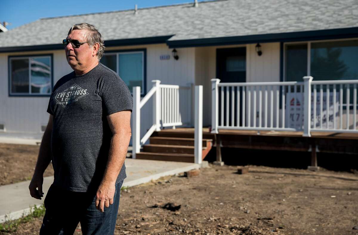 Coffey Park homeowner Lenny Briese stands outside his newly-constructed home along Coffey Lane in the Coffey Park neighborhood of Santa Rosa, Calif. Thursday, Jan. 24, 2019.