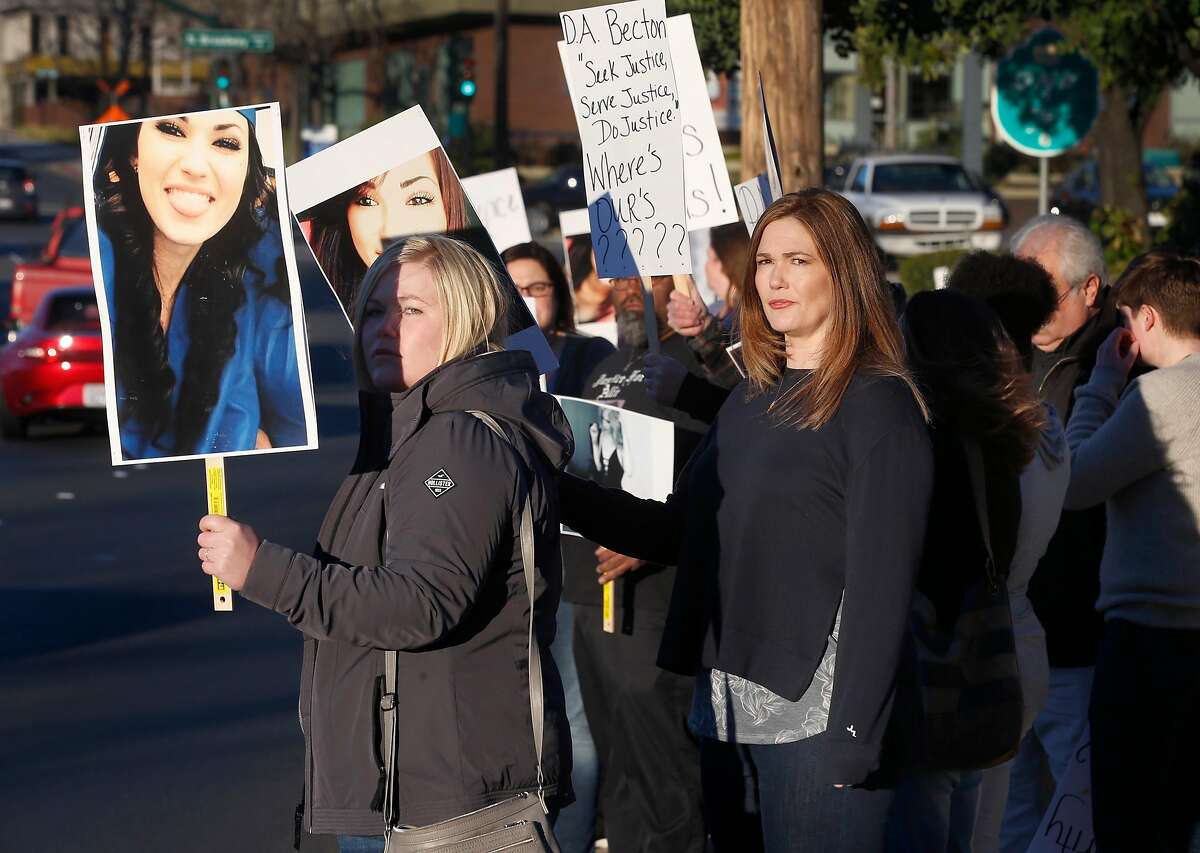 Allie Sweitzer�s mother Melanie Schwartz (right) protests with family and supporters outside Contra Costa County Superior Court in Walnut Creek, Calif. on Thursday, Jan. 24, 2019 before a hearing for Allie Sweitzer's accused killer will be held in juvenile court. Authorities say Sweitzer, 20, was murdered in 2017 by a 15-year-old gang member and was originally ordered to stand trial in adult court but a new law that went into effect Jan. 1 says no one under the age of 16 can be tried as an adult.