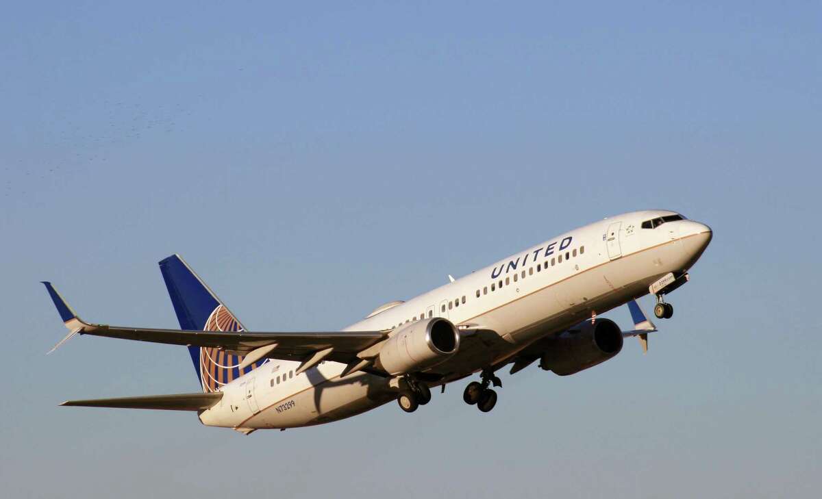 A United Airlines Boeing 737 takes off from Bush Intercontinental Airport.