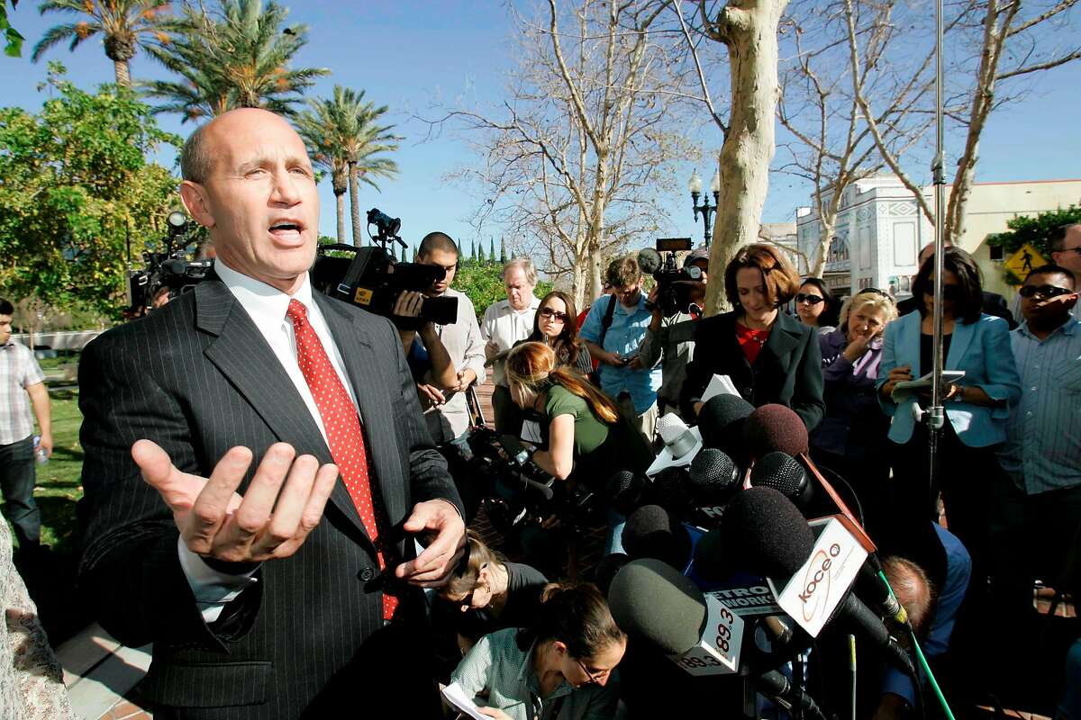 Former Orange County Sheriff Mike Carona speaks at a news conference outside court in Santa Ana, Calif., Friday, Jan. 16, 2009. A jury stunned a courtroom Friday by acquitting Carona of a sweeping corruption conspiracy and all but one related count of witness tampering in a case that alleged extensive bribery in exchange for the power of his office. (AP Photo/Nick Ut)